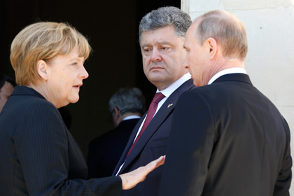 Порошенко и Меркель решили встретиться с Путиным и Олландом